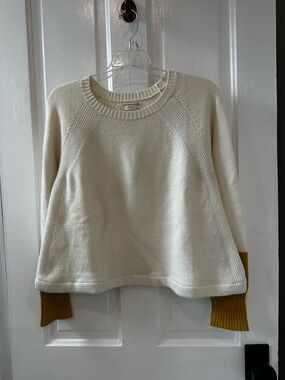 Anthropologie Cream Crewneck Sweater with Mustard Cuffs